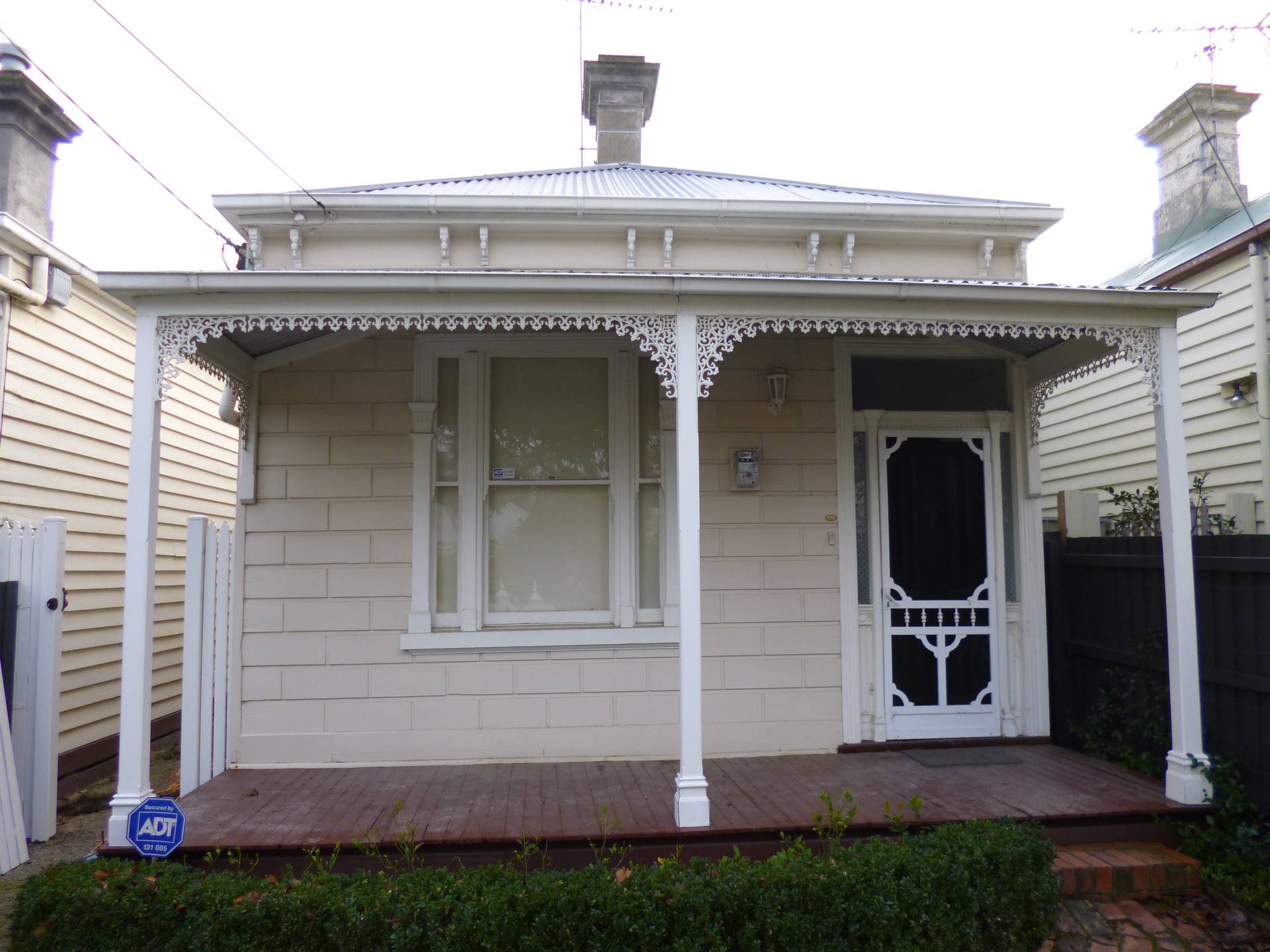 Before photo of the block weatherboard front Victorian period home in Hawthorn East