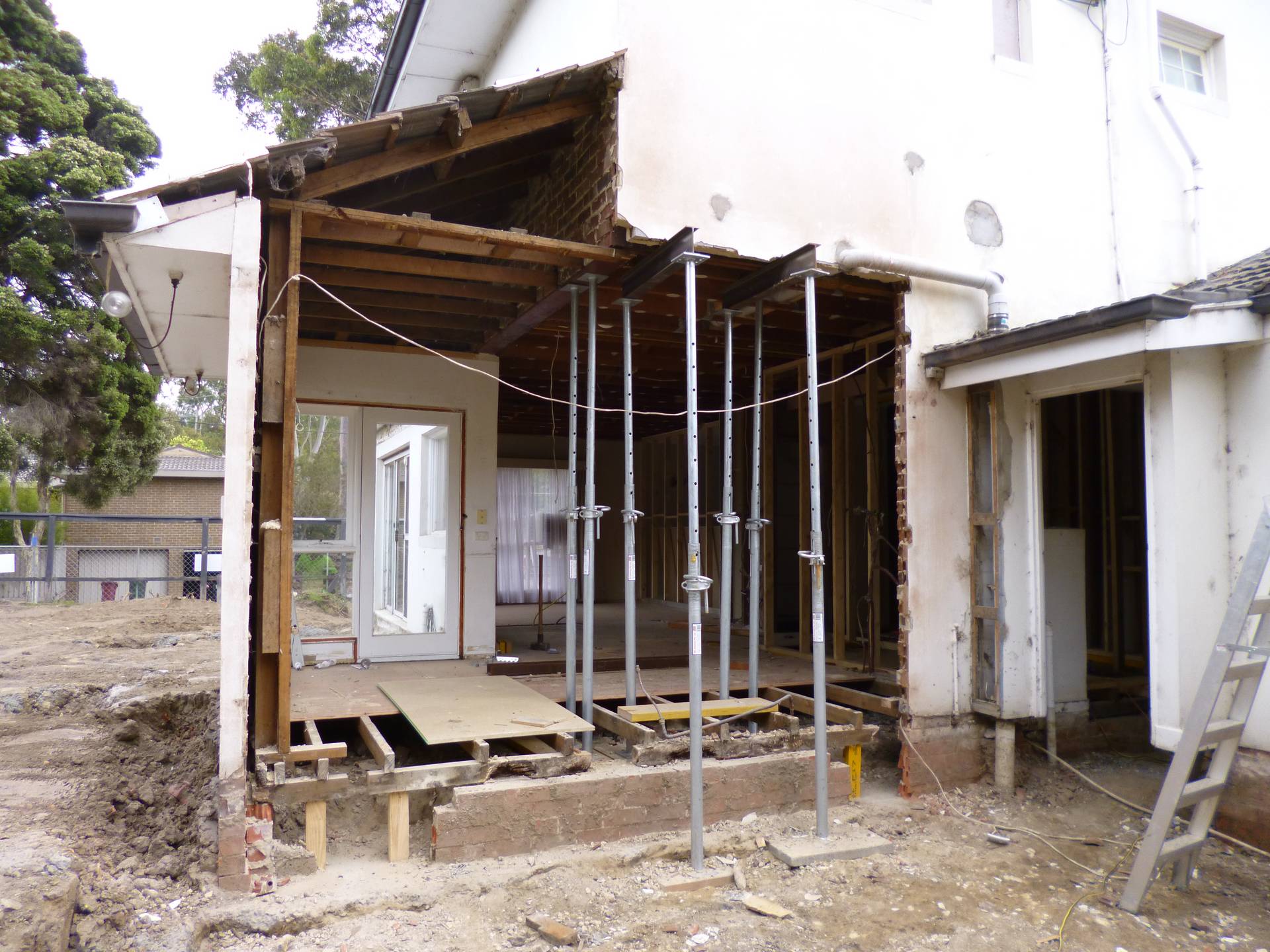 Removal of existing brick wall to create a new opening 