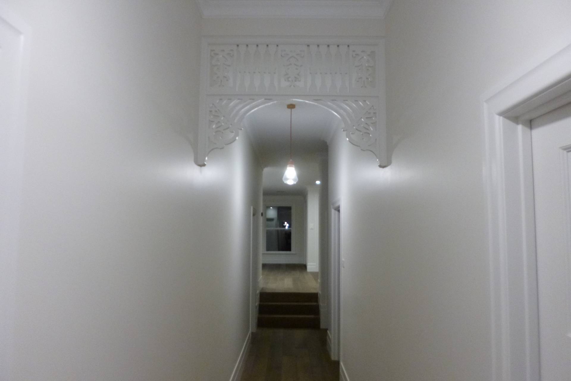 Timber fret work feature for the hallway